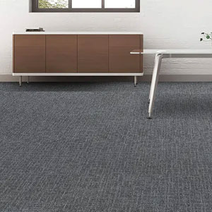 Acoustic floor underlay fitted beneath laminate flooring in a living room