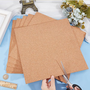 Fine grain adhesive cork sheets cut into coaster shapes for craft projects