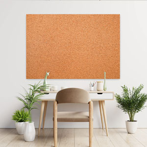 Natural cork sheets used as coasters and craft materials on a work table